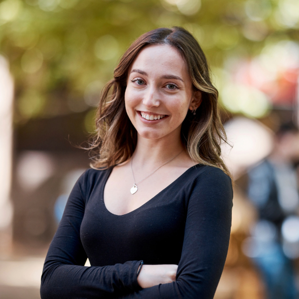 Notre Dame student wearing black top in Sydney campus courtyard